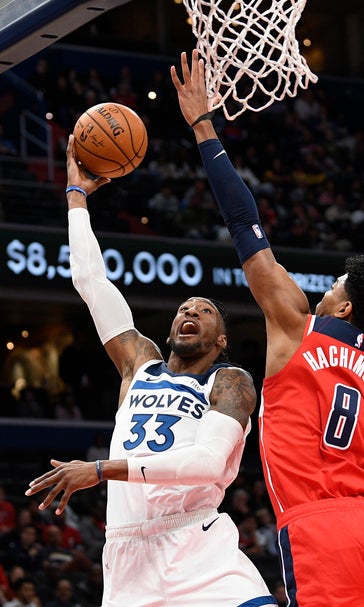 Wiggins' 21 points lead Wolves over Wizards, 131-109